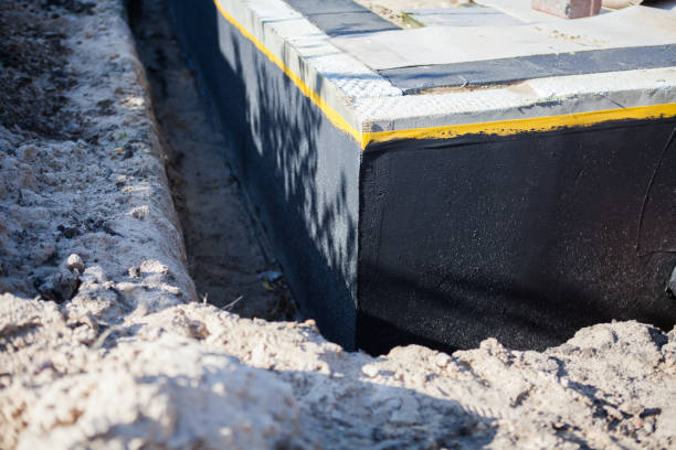 Professional Emergency Waterproofing technician working in Gowen, MI